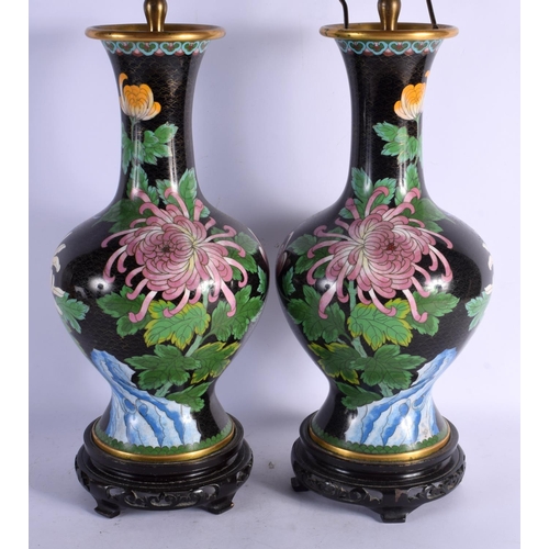 1694 - A PAIR OF EARLY 20TH CENTURY CHINESE CLOISONNE ENAMEL VASES converted to lamps. 56 cm high overall.