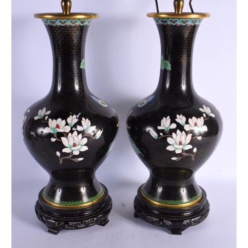 1694 - A PAIR OF EARLY 20TH CENTURY CHINESE CLOISONNE ENAMEL VASES converted to lamps. 56 cm high overall.