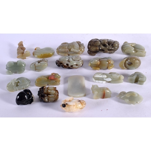 1697 - A GROUP OF TWENTY CHINESE CARVED JADE ANIMALS AND PLAQUES 20th Century, in various forms and sizes. ... 