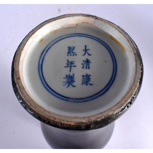 1718 - A 19TH CENTURY CHINESE FAMLLE NOIRE PORCELAIN VASE bearing Kangxi marks to base. 31 cm high.