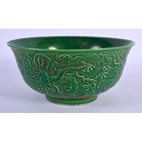 1728 - A CHINESE GREEN GLAZED PORCELAIN DRAGON BOWL 20th Century. 14 cm diameter.