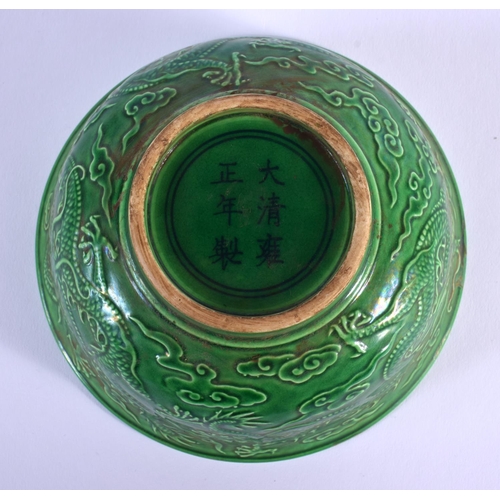 1728 - A CHINESE GREEN GLAZED PORCELAIN DRAGON BOWL 20th Century. 14 cm diameter.