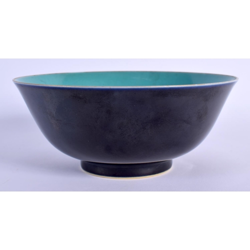 1729 - A CHINESE BLACK GLAZED PORCELAIN BOWL 20th Century. 14 cm diameter.