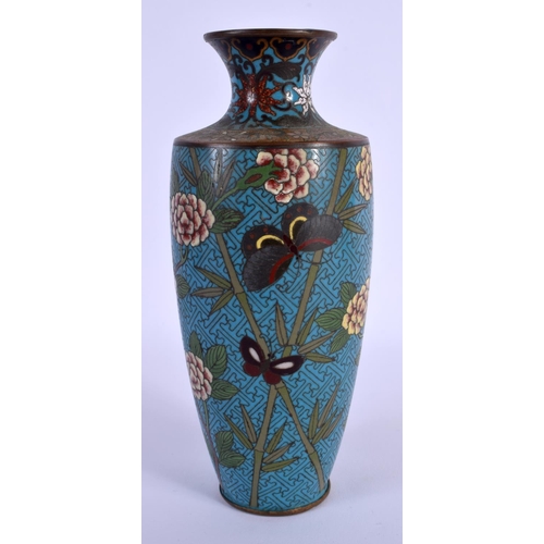 1737 - A LATE 19TH CENTURY JAPANESE MEIJI PERIOD CLOISONNE ENAMEL VASE decorated with foliage. 18 cm high.