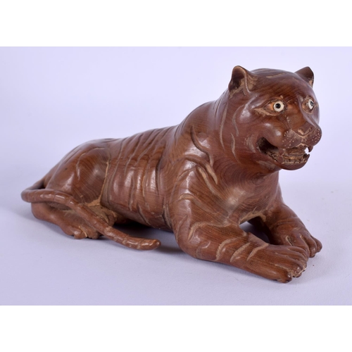 1739 - A JAPANESE CARVED BOXWOOD OKIMONO OF A TIGER. 13 cm x 7 cm.