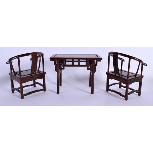 1748 - A RARE GROUP OF EARLY 20TH CENTURY CHINESE CARVED WOOD MINIATURE FURNITURE formed as a pair of chair... 