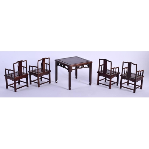 1749 - A RARE GROUP OF EARLY 20TH CENTURY CHINESE CARVED WOOD MINIATURE FURNITURE formed as a two pairs of ... 