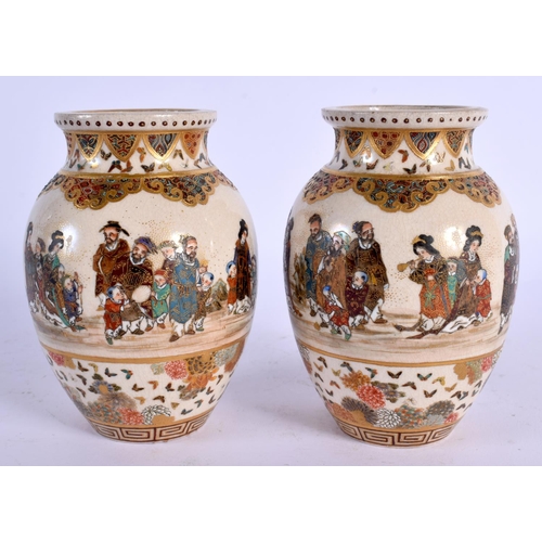 1802 - A FINE PAIR OF 19TH CENTURY JAPANESE MEIJI PERIOD SATSUMA VASES painted with figures and butterflies... 