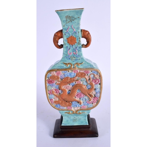 1816 - A 19TH CENTURY CHINESE TWIN HANDLED PORCELAIN VASE bearing Qianlong marks to base, carved with drago... 