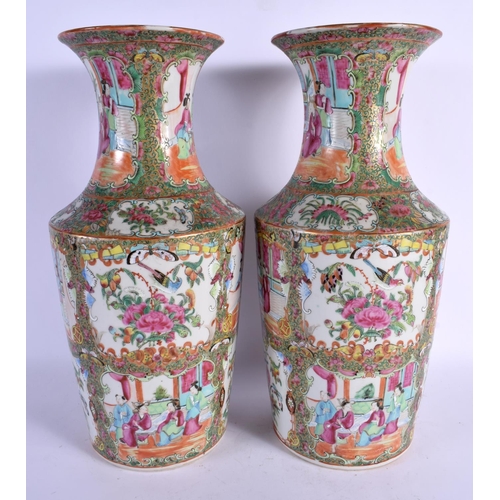 1821 - A LARGE PAIR OF 19TH CENTURY CHINESE CANTON FAMILLE ROSE VASES Qing, painted with figures. 38 cm x 1... 