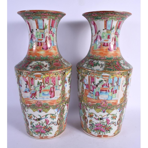 1821 - A LARGE PAIR OF 19TH CENTURY CHINESE CANTON FAMILLE ROSE VASES Qing, painted with figures. 38 cm x 1... 