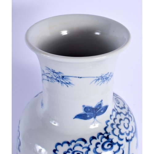 1824 - A 19TH CENTURY CHINESE BLUE AND WHITE PORCELAIN VASE Kangxi style. 32 cm high.