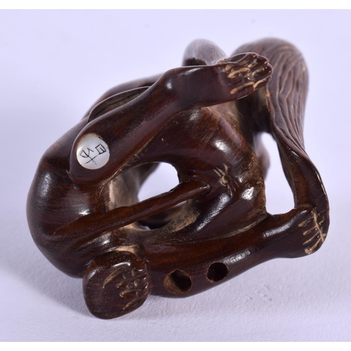 1839 - A JAPANESE BOXWOOD MONKEY OKIMONO. 4.5 cm x 3 cm.