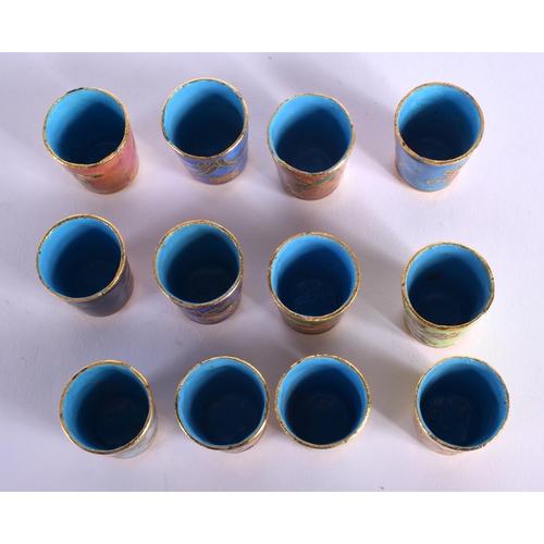 1845 - TWELVE CHINESE CLOISONNE ENAMEL THIMBLES. 2.5 cm x 2 cm. (12)