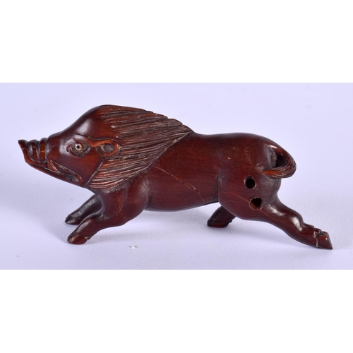 1849 - A JAPANESE BOXWOOD BOAR NETSUKE. 9 cm x 3.5 cm.