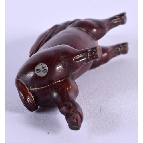 1849 - A JAPANESE BOXWOOD BOAR NETSUKE. 9 cm x 3.5 cm.