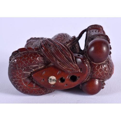 1855 - A JAPANESE BOXWOOD DRAGON NETSUKE. 4 cm x 3 cm.