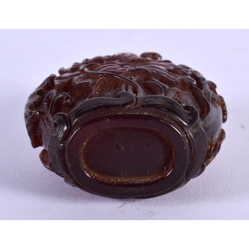 1856 - A CHINESE CARVED AMBER SNUFF BOTTLE 20th Century. 65 grams. 8 cm x 5.5 cm.