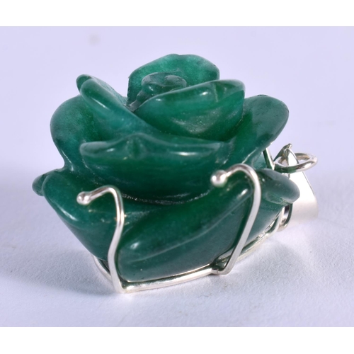 1887 - A CHINESE CARVED JADE AND SILVER PENDANT 20th Century. 17 grams. 3.75 cm x 2.75 cm.