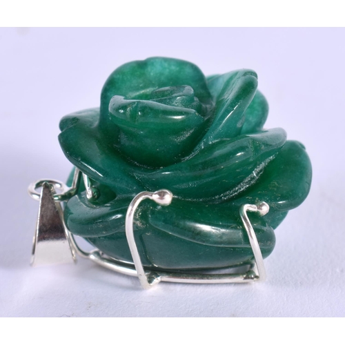 1887 - A CHINESE CARVED JADE AND SILVER PENDANT 20th Century. 17 grams. 3.75 cm x 2.75 cm.