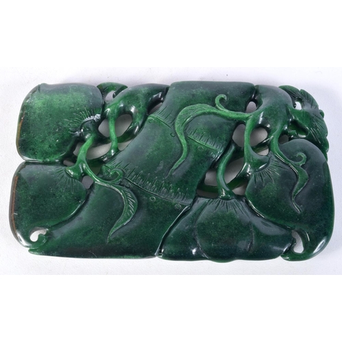 3001 - A Chinese carved Jade boulder in the form of a fruiting pod 11.5 x 7 cm