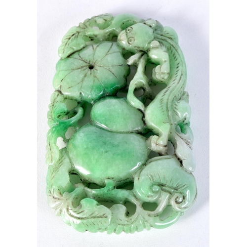 3010 - A Chinese carved Jade boulder in the form of a fruiting pod 10 x 6 cm.