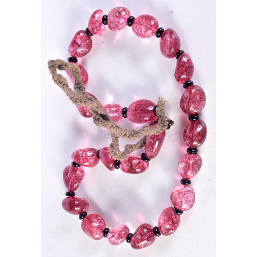 3022 - A pink Thulite stone necklace 62 cm.