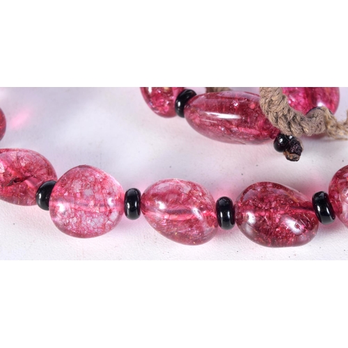 3022 - A pink Thulite stone necklace 62 cm.