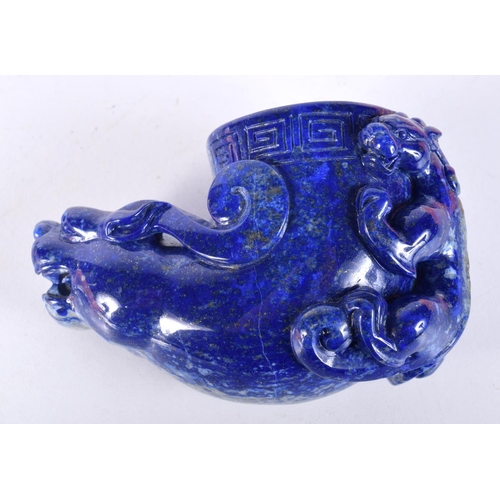 3026 - A carved Lapis Lazuli boulder in the form of a beast 6 x 10 cm.