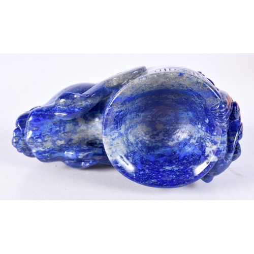 3026 - A carved Lapis Lazuli boulder in the form of a beast 6 x 10 cm.