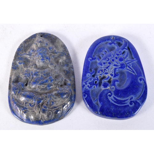 3029 - A pair of Lapis Lazuli carved pendants 6 x 4.5 cm (2).