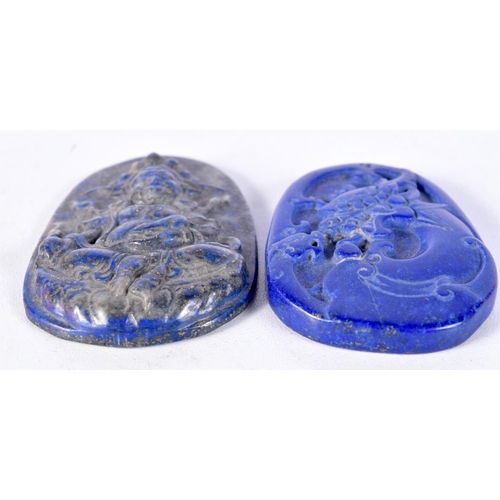 3029 - A pair of Lapis Lazuli carved pendants 6 x 4.5 cm (2).