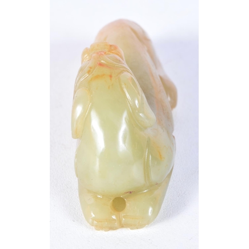 3031 - A carved jade boulder in the form of a beast 7cm .