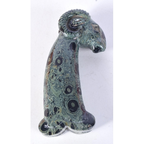 3042 - A carved hardstone dagger handle in the form of a Rams head 13 cm.