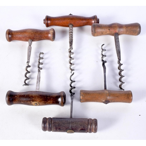 3060 - A collection of antique wooden handled corkscrews with facetted and flat shanks  (6).