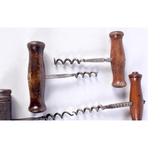 3060 - A collection of antique wooden handled corkscrews with facetted and flat shanks  (6).