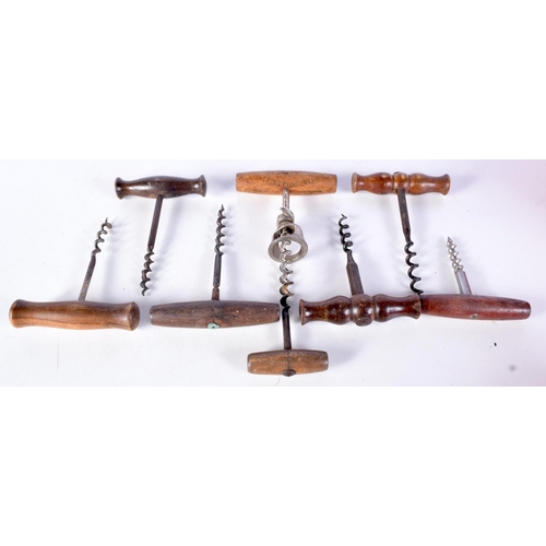 3062 - A collection of antique wooden handled corkscrews (8).