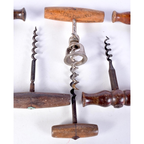 3062 - A collection of antique wooden handled corkscrews (8).