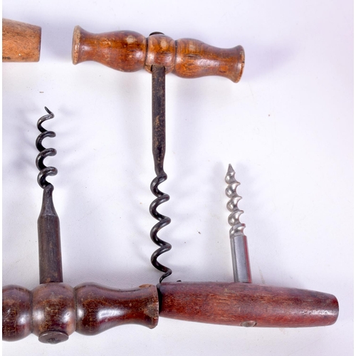 3062 - A collection of antique wooden handled corkscrews (8).