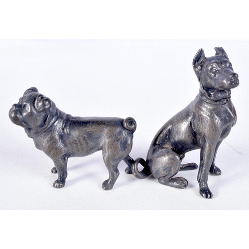 3072 - A small cast metal WMFB stamped model of a dog together with another smaller model 7 cm (2).