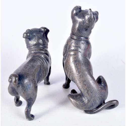 3072 - A small cast metal WMFB stamped model of a dog together with another smaller model 7 cm (2).