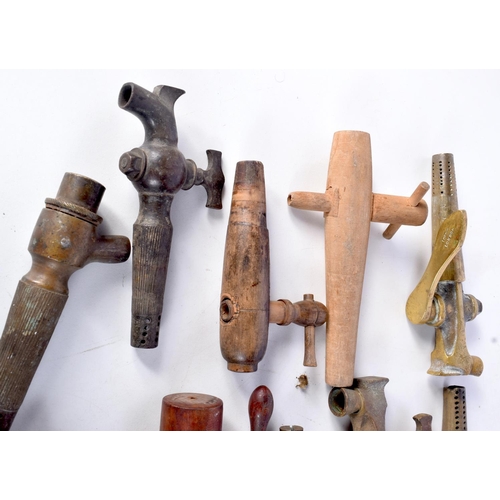 3076 - A collection of brass antique beer taps together with wooden taps largest 23 cm (17)