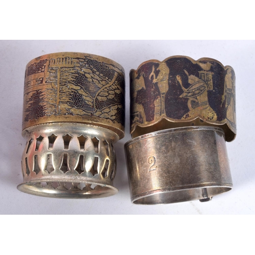 3079 - A collection of napkin rings horn, plate etc 4.5 cm (17)