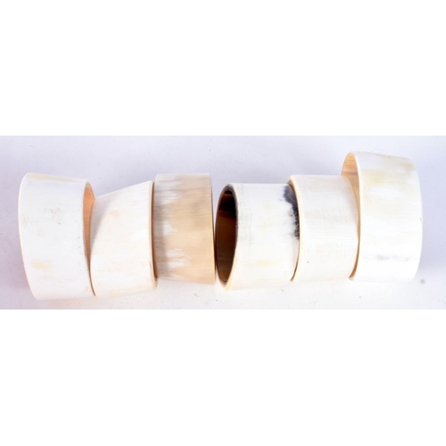 3079 - A collection of napkin rings horn, plate etc 4.5 cm (17)