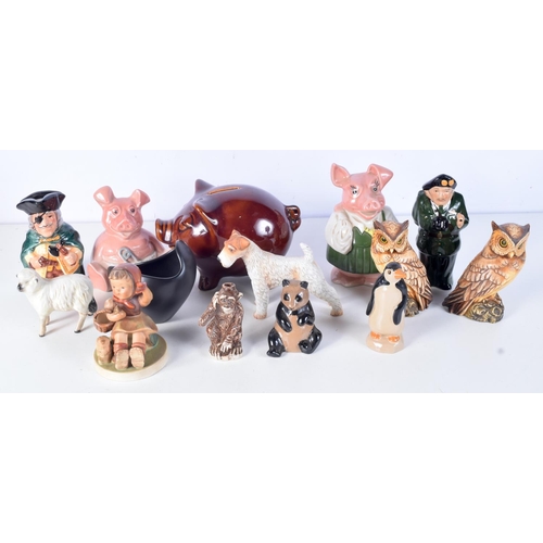 3090 - A collection of porcelain  money boxes , toby jugs, porcelain animals, Beswick etc (14)