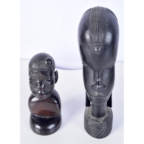 3094 - A collection of African tribal wooden carvings and a terracotta head . largest 40 cm.(10)