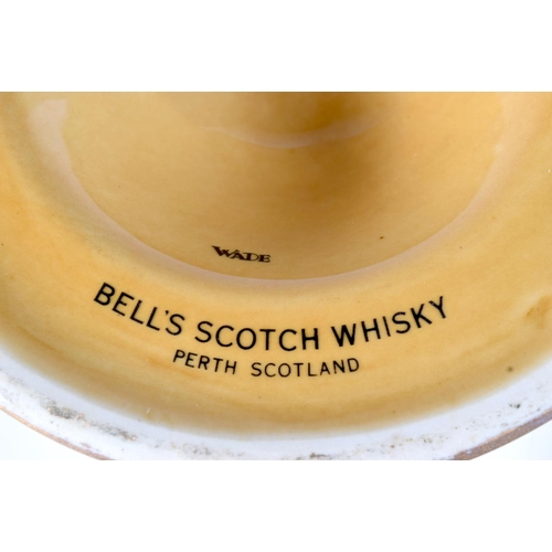 3098 - A collection of Wade Bells Scotch Whiskey bell decanters 25 cm (8).