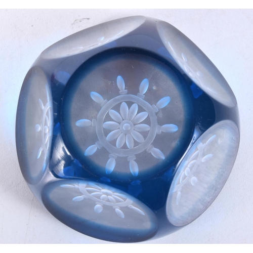 3117 - A Webb Corbett blue ships wheel faceted paper weight 4.5 x 7.5  cm.