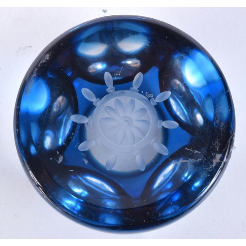 3117 - A Webb Corbett blue ships wheel faceted paper weight 4.5 x 7.5  cm.