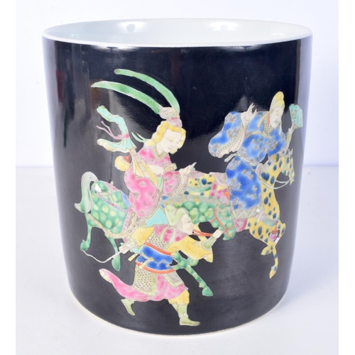 3119 - A large Chinese porcelain Famille Noire planter decorated with figures and horse riders. 21 x 20cm.